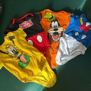 Disney lot of 4 onesies 0-3 months